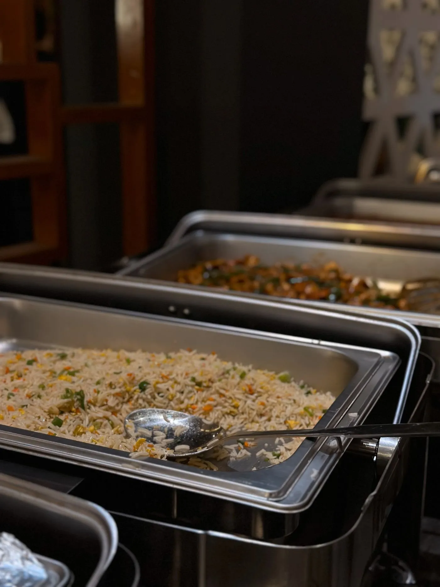 Freshly prepared food served in catering trays