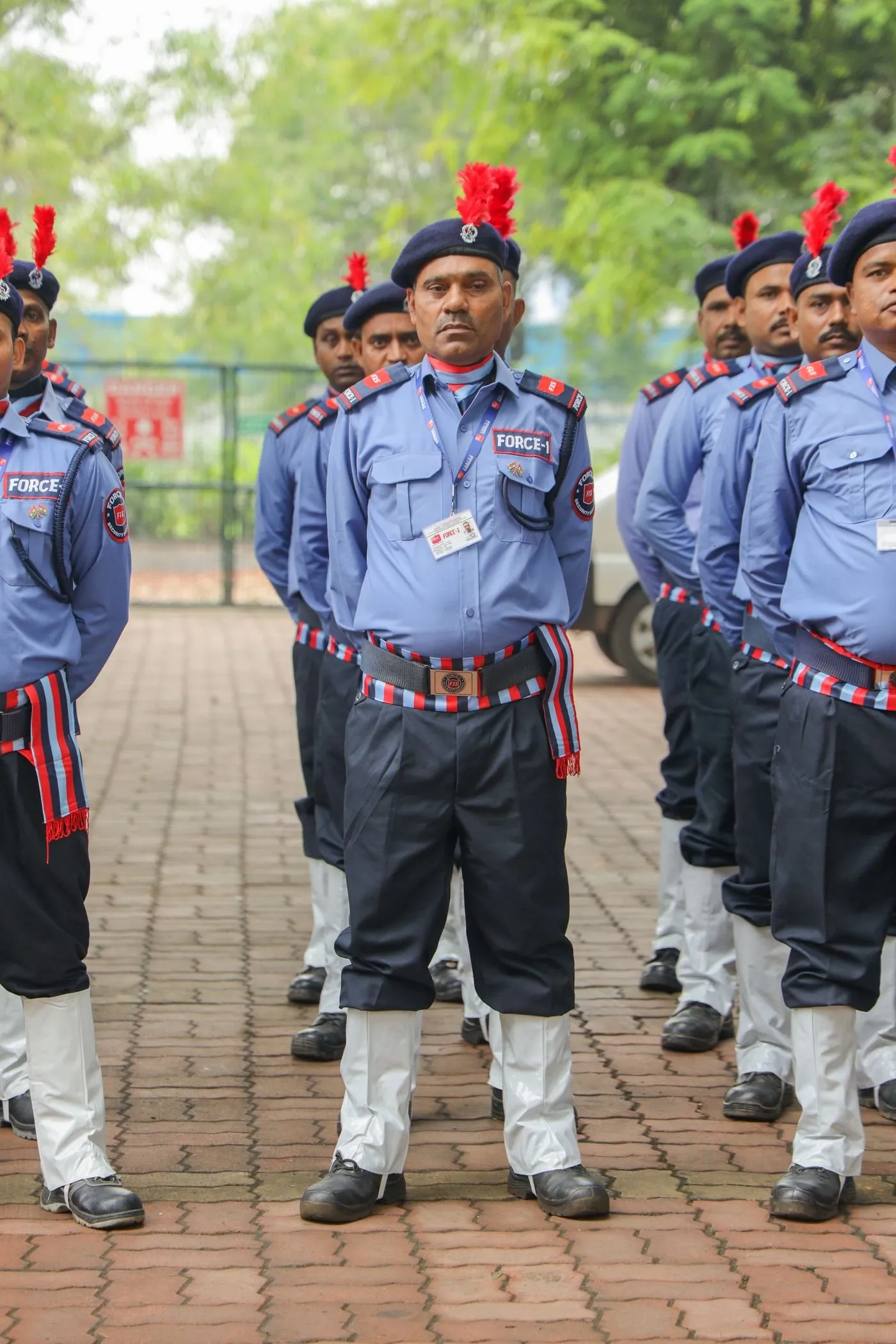 Uniformed security personnel standing in formation